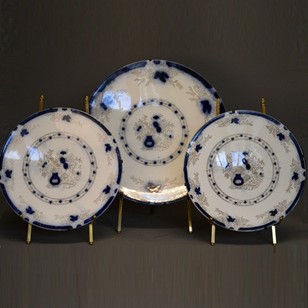 Three blue/white decorative chargers/plates